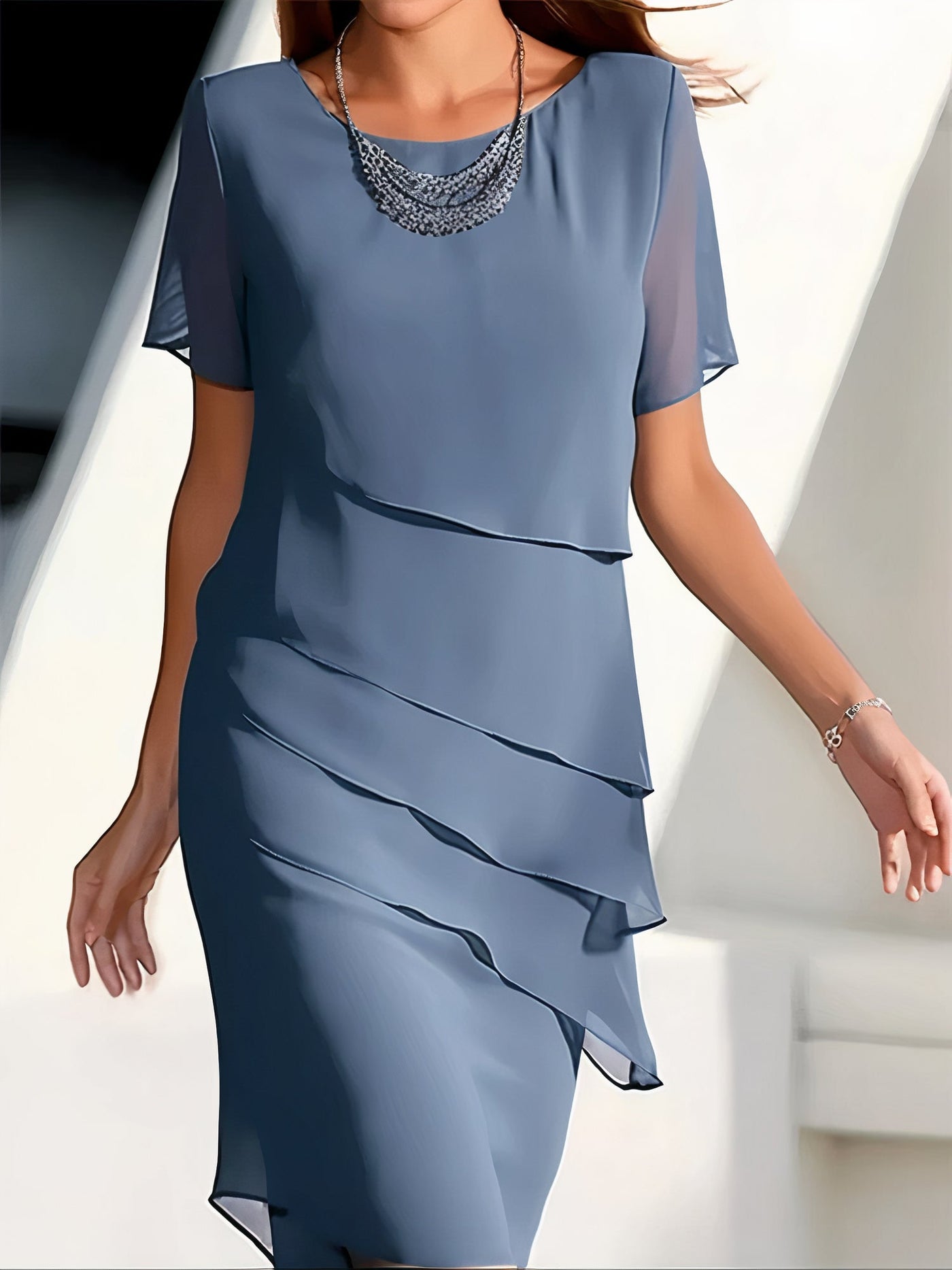 Geplooide chiffonjurk